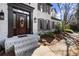 Inviting home exterior featuring a decorative wood front door with sidelights at 203 Northside Nw Dr, Kennesaw, GA 30144