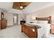 Spacious main bedroom features tray ceilings, ceiling fan, and plenty of natural light at 203 Northside Nw Dr, Kennesaw, GA 30144