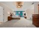 Spacious primary bedroom with vaulted ceiling, large windows, and neutral color scheme at 203 Northside Nw Dr, Kennesaw, GA 30144