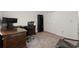 Home office space with a large desk, storage, and comfortable rolling office chair at 203 Northside Nw Dr, Kennesaw, GA 30144