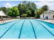 Inviting swimming pool offers a refreshing retreat with clear blue water and ample seating for residents to enjoy at 203 Northside Nw Dr, Kennesaw, GA 30144