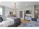 Bedroom with a comfortable bed and a sitting area at 3475 Landen Pine Ne Ct, Atlanta, GA 30305
