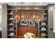 Modern dining room showcasing a stylish chandelier, gray shelving and upholstered bench seating at 3475 Landen Pine Ne Ct, Atlanta, GA 30305