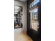 Elegant entryway with a large mirror, hardwood floors, and a view of the exterior at 3475 Landen Pine Ne Ct, Atlanta, GA 30305