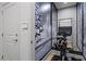 Home exercise room with mirrored wall, stationary bike, and view of the winter landscape wallpaper at 3475 Landen Pine Ne Ct, Atlanta, GA 30305
