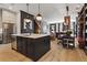 Spacious eat-in kitchen with a large island, stainless steel appliances, and hardwood floors at 3475 Landen Pine Ne Ct, Atlanta, GA 30305