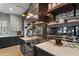 Stunning kitchen with a tile backsplash, stainless steel oven, and modern cabinetry at 3475 Landen Pine Ne Ct, Atlanta, GA 30305