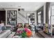 Bright living room with stylish decor, comfortable seating, and a staircase leading to the upper level at 3475 Landen Pine Ne Ct, Atlanta, GA 30305