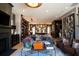 Comfortable living room with stylish furniture, fireplace, and open floorplan at 3475 Landen Pine Ne Ct, Atlanta, GA 30305