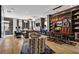 Expansive living room with a dining area, fireplace, and access to the outdoors at 3475 Landen Pine Ne Ct, Atlanta, GA 30305