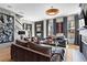 Well-appointed living room featuring hardwood floors, stylish decor, and comfortable seating at 3475 Landen Pine Ne Ct, Atlanta, GA 30305