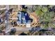 Aerial view of the house with landscaping and driveway at 372 Karen Dr, Alpharetta, GA 30009