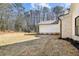 A large backyard with new grass, landscaping and an irrigation system at 372 Karen Dr, Alpharetta, GA 30009