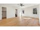 Bright bedroom features hardwood floors, a ceiling fan, and two windows at 372 Karen Dr, Alpharetta, GA 30009