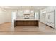 Bright kitchen featuring a large central island with marble countertops and stainless steel appliances at 372 Karen Dr, Alpharetta, GA 30009