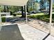 Spacious carport showcasing the driveway and a glimpse of the neighborhood surroundings at 812 Amber Place Nw, Atlanta, GA 30331