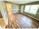 This spacious living room has wood floors and is flooded with natural light at 812 Amber Place Nw, Atlanta, GA 30331