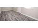 Tiled basement area featuring a door and a window allowing natural light at 1887 King Charles Sw Rd, Atlanta, GA 30331