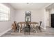 Dining room with wood table and metal chairs at 1887 King Charles Sw Rd, Atlanta, GA 30331