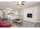 Open floor plan with living room and kitchen view, showcasing modern decor and great light at 1887 King Charles Sw Rd, Atlanta, GA 30331
