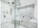 A marble spa shower features a rain head, body jets and thermostatic controls at 845 Spring Nw St # 502, Atlanta, GA 30308