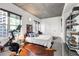 A comfortable bedroom features great light and polished concrete floors at 845 Spring Nw St # 502, Atlanta, GA 30308