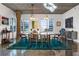 Elegant dining room with modern lighting, a glass table, and stylish seating complemented by sophisticated decor at 845 Spring Nw St # 502, Atlanta, GA 30308