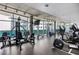 Well-equipped gym with floor to ceiling windows and a variety of exercise machines at 845 Spring Nw St # 502, Atlanta, GA 30308
