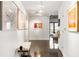 Hallway featuring polished concrete floor, white walls with artwork, and modern lighting fixtures at 845 Spring Nw St # 502, Atlanta, GA 30308