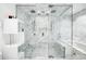 Modern bathroom shower with marble walls, dual shower heads, and glass enclosures at 845 Spring Nw St # 502, Atlanta, GA 30308