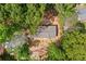 Aerial view of house with a new roof surrounded by mature trees and natural landscape at 160 Vandiver Rd, Canton, GA 30114