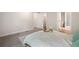 Serene bedroom featuring a plush bed, walk-in closet, and en-suite bathroom at 160 Vandiver Rd, Canton, GA 30114