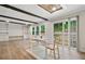 Dining area with sliding glass doors, wood floors, and recessed lighting at 160 Vandiver Rd, Canton, GA 30114