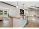 Open-concept kitchen with center island, stainless steel appliances, and adjacent dining area at 160 Vandiver Rd, Canton, GA 30114