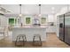 Modern kitchen with stainless steel appliances, an island, and sleek countertops at 160 Vandiver Rd, Canton, GA 30114