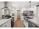 Modern kitchen featuring stainless steel appliances, sleek countertops, and ample cabinet space at 160 Vandiver Rd, Canton, GA 30114
