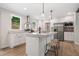 Bright kitchen with stainless appliances, large center island, and pendant lighting at 160 Vandiver Rd, Canton, GA 30114