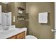 Bathroom featuring a combination shower and tub and decorative accents at 1384 Stone Bay Sw Dr, Atlanta, GA 30331