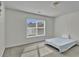 Minimalist bedroom with a bright window and simple decor at 1384 Stone Bay Sw Dr, Atlanta, GA 30331