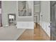 Inviting entryway with hardwood floors, wainscoting, and a staircase leading to the upper level at 1384 Stone Bay Sw Dr, Atlanta, GA 30331