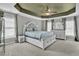 Spacious main bedroom boasts tray ceiling, large windows and ample natural light at 1384 Stone Bay Sw Dr, Atlanta, GA 30331