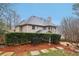 Well-maintained backyard with lush hedges offering privacy and a peaceful outdoor setting at 1884 Point River Dr, Duluth, GA 30097