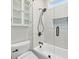 Bright bathroom features modern fixtures, glass shower door, and neutral tile at 1884 Point River Dr, Duluth, GA 30097