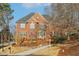 Charming brick two-story home with well-maintained landscaping and a welcoming entrance at 1884 Point River Dr, Duluth, GA 30097