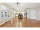 Spacious kitchen with hardwood floors, white cabinets, and a center island with seating at 1884 Point River Dr, Duluth, GA 30097