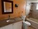 Bathroom with a sink, vanity, toilet and tile shower at 3310 Pilgrim Mill Rd, Cumming, GA 30041