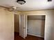 Bedroom featuring a ceiling fan and built in closet at 3310 Pilgrim Mill Rd, Cumming, GA 30041