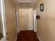 Hallway with three doors and painted walls at 3310 Pilgrim Mill Rd, Cumming, GA 30041