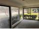Sunroom with multiple large glass windows and nature view at 3310 Pilgrim Mill Rd, Cumming, GA 30041