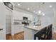 Well-designed kitchen featuring granite counters, a breakfast bar with seating, and stainless steel appliances at 3891 Shelleydale Dr, Powder Springs, GA 30127